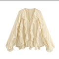 Blusa con volantes para mujer